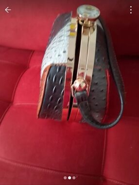 Ostrich-Textured Faux Leather Wristlet in Black and Brown